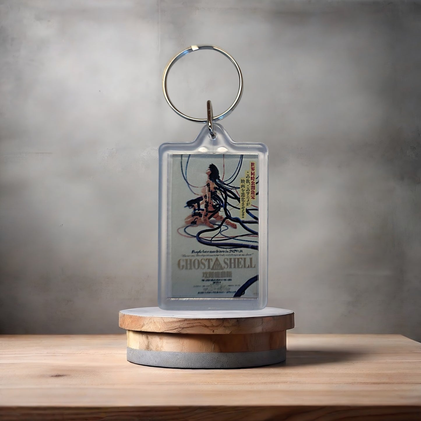 Ghost in the Shell anime keychain with metal prints encased. V3