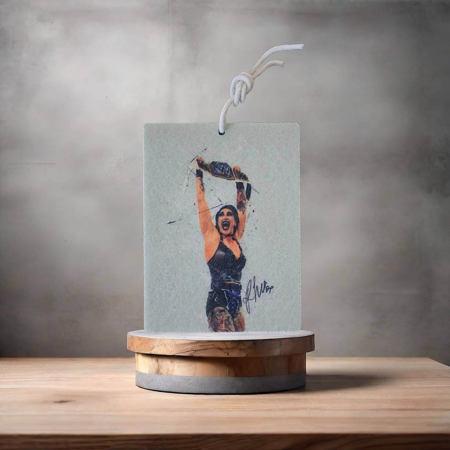 Rhea Ripley wrestling photo on car air freshener. Many scents to choose from