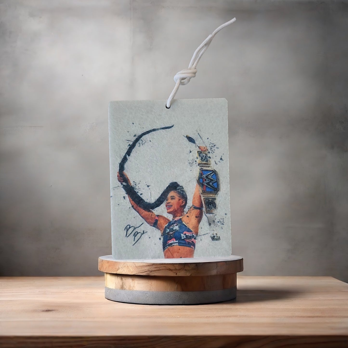 Bianca Belair wrestling photo on car air freshener. Many scents to choose from