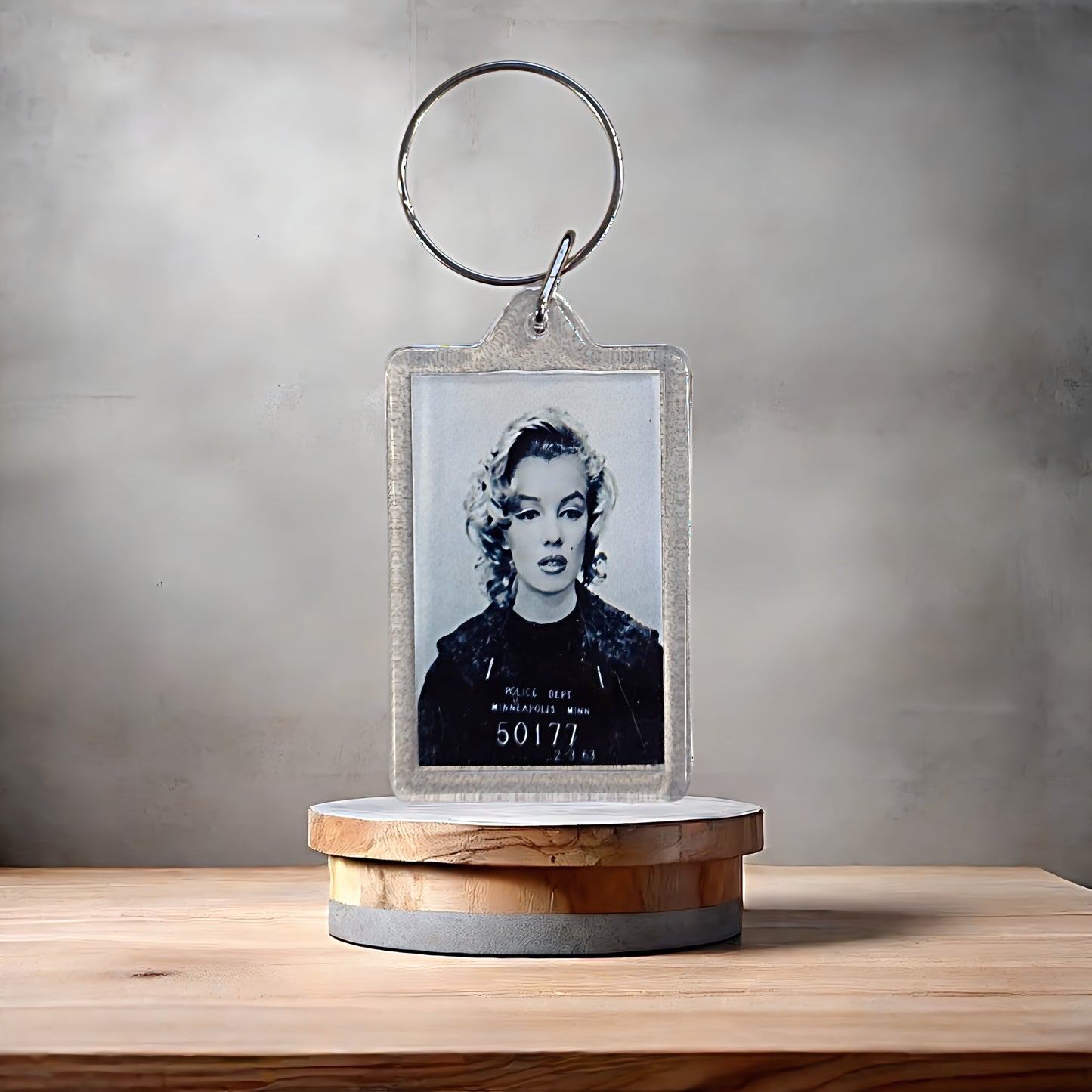 Marilyn Monroe mugshot poster keychain with metal prints. Adult