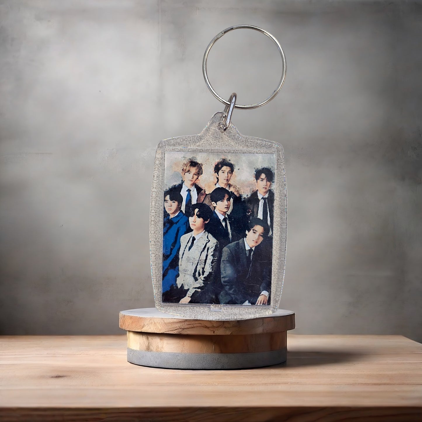 Kpop group BTS poster keychain on aluminum prints.