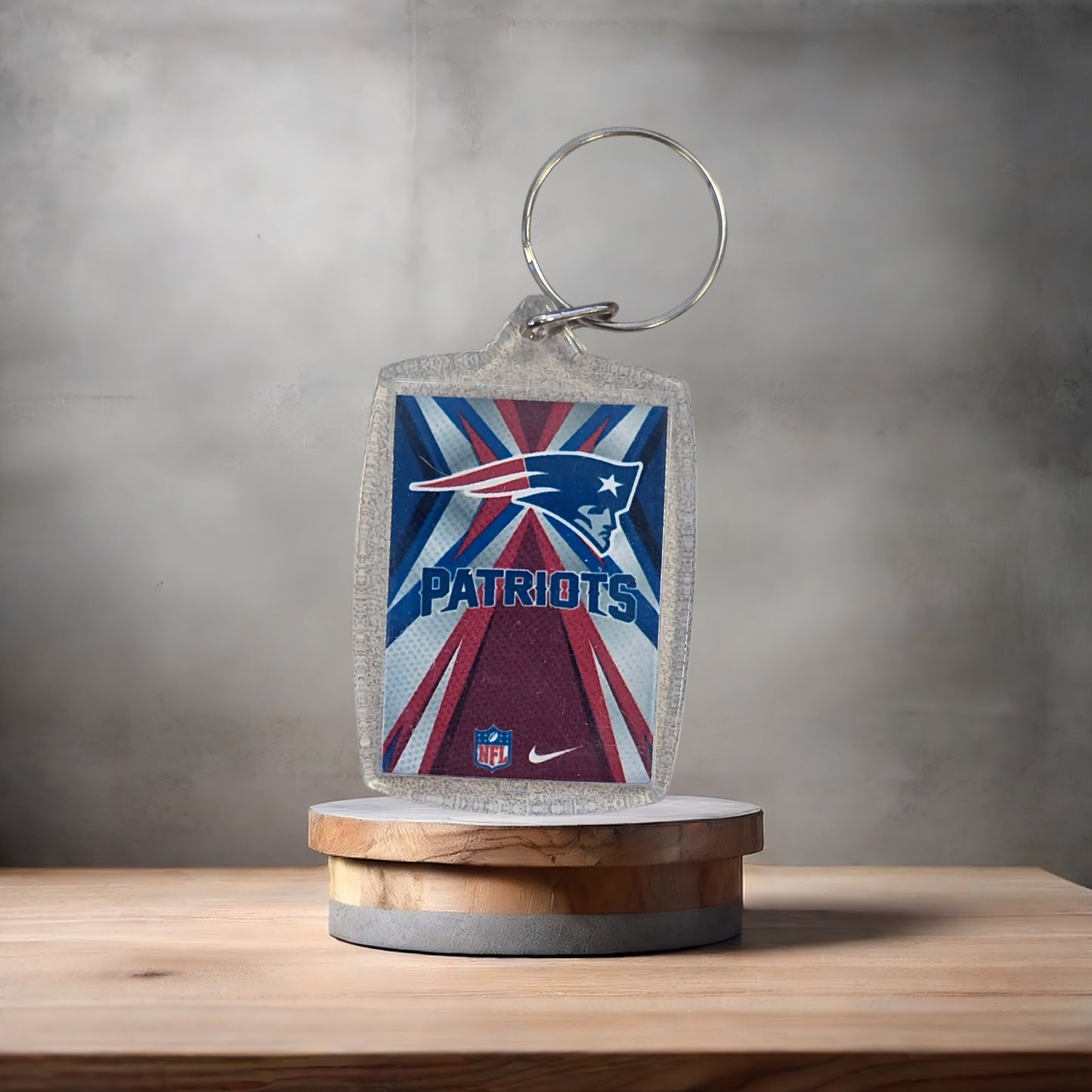 New England Patriots Nike poster keychain on aluminum prints.