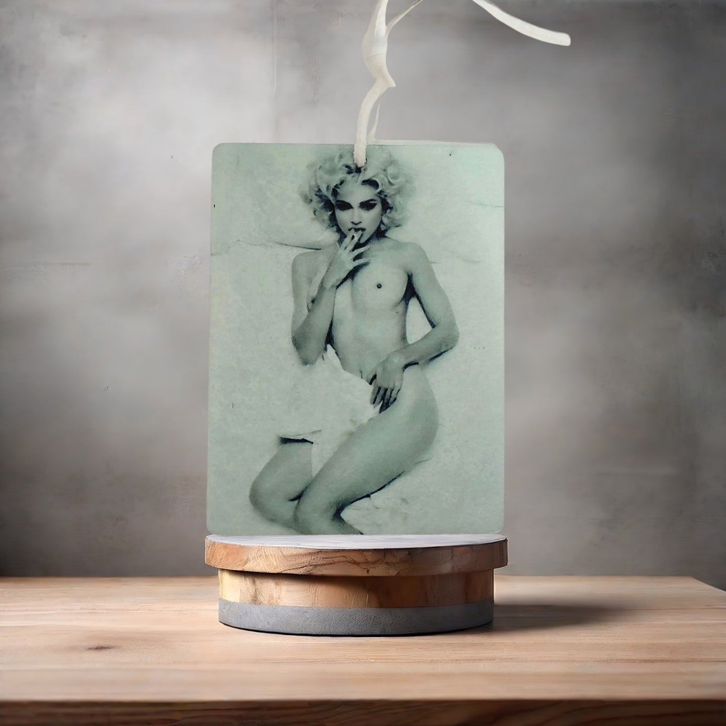 Nude Madonna black and white car air freshener. Many scents to choose from.