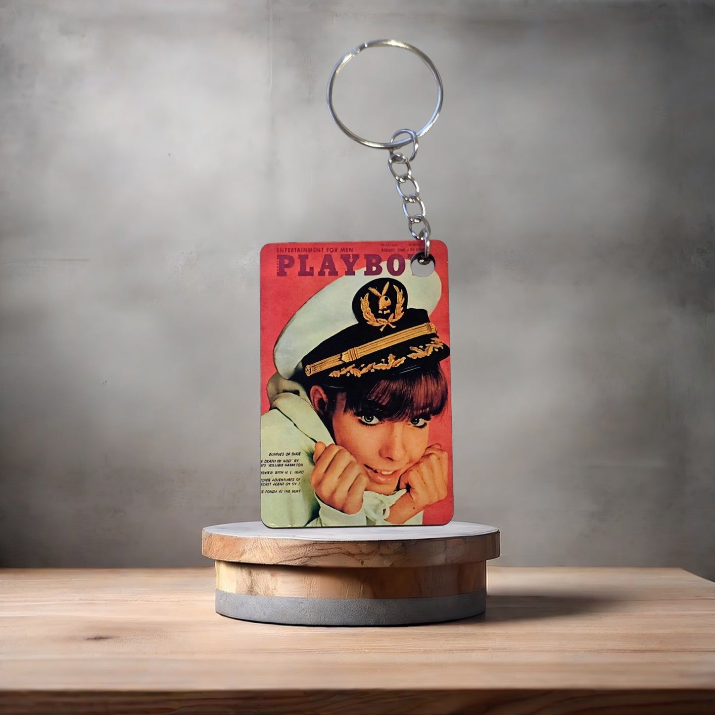 Playboy magazine cover keychain. August 1966