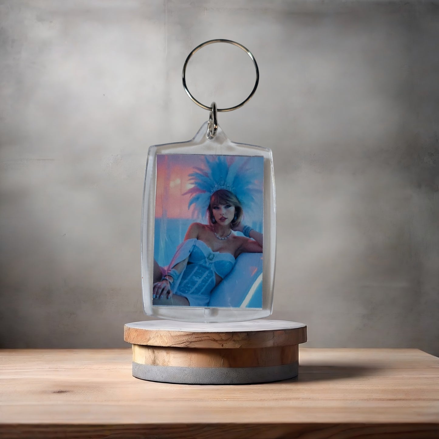 Taylor Swift keychain on aluminum prints. Showgirl