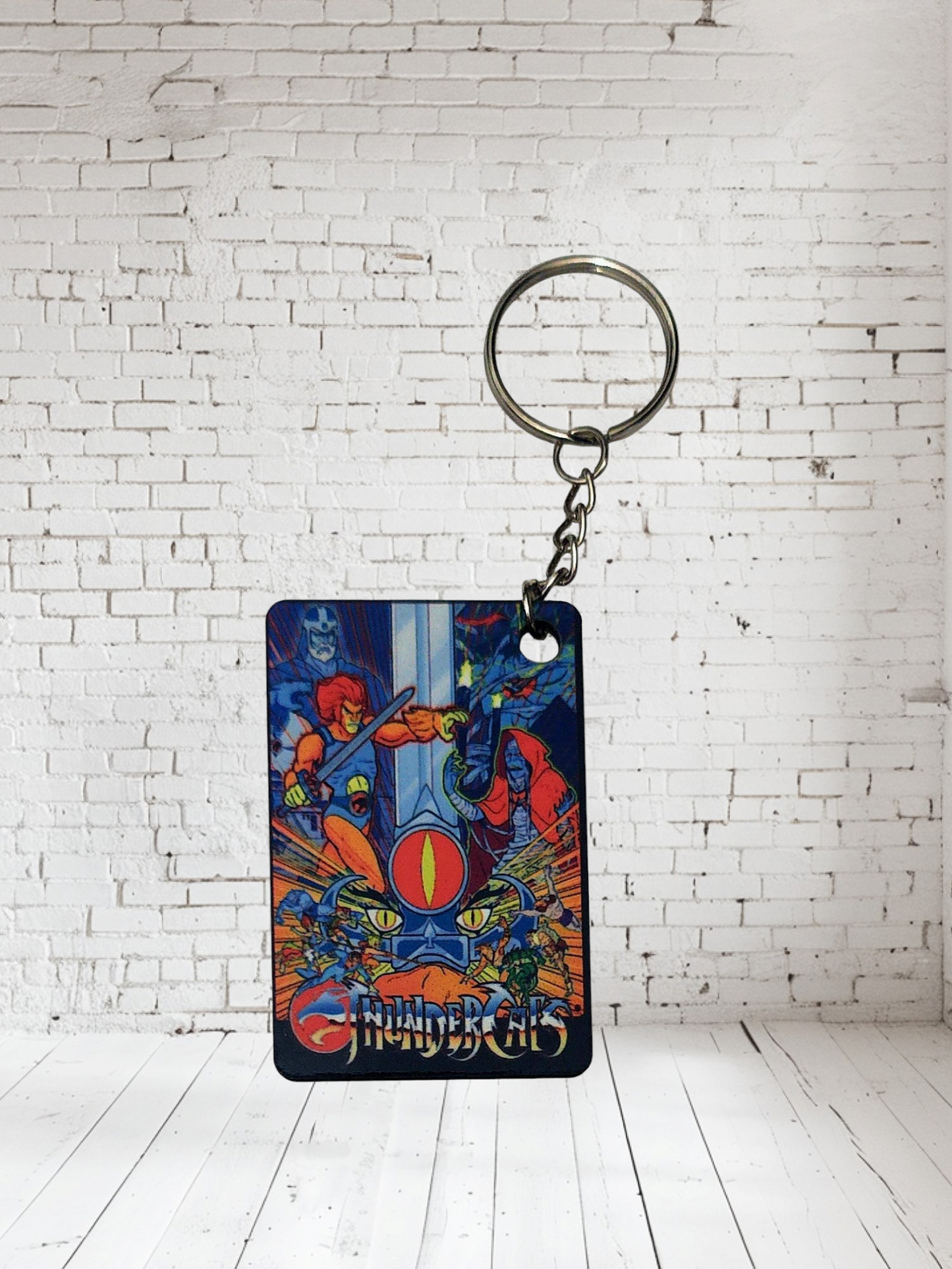 1980's cartoons The Smurfs, Thundercats, Inspecor Gadget and more poster keychains. Multiple designs to choose from