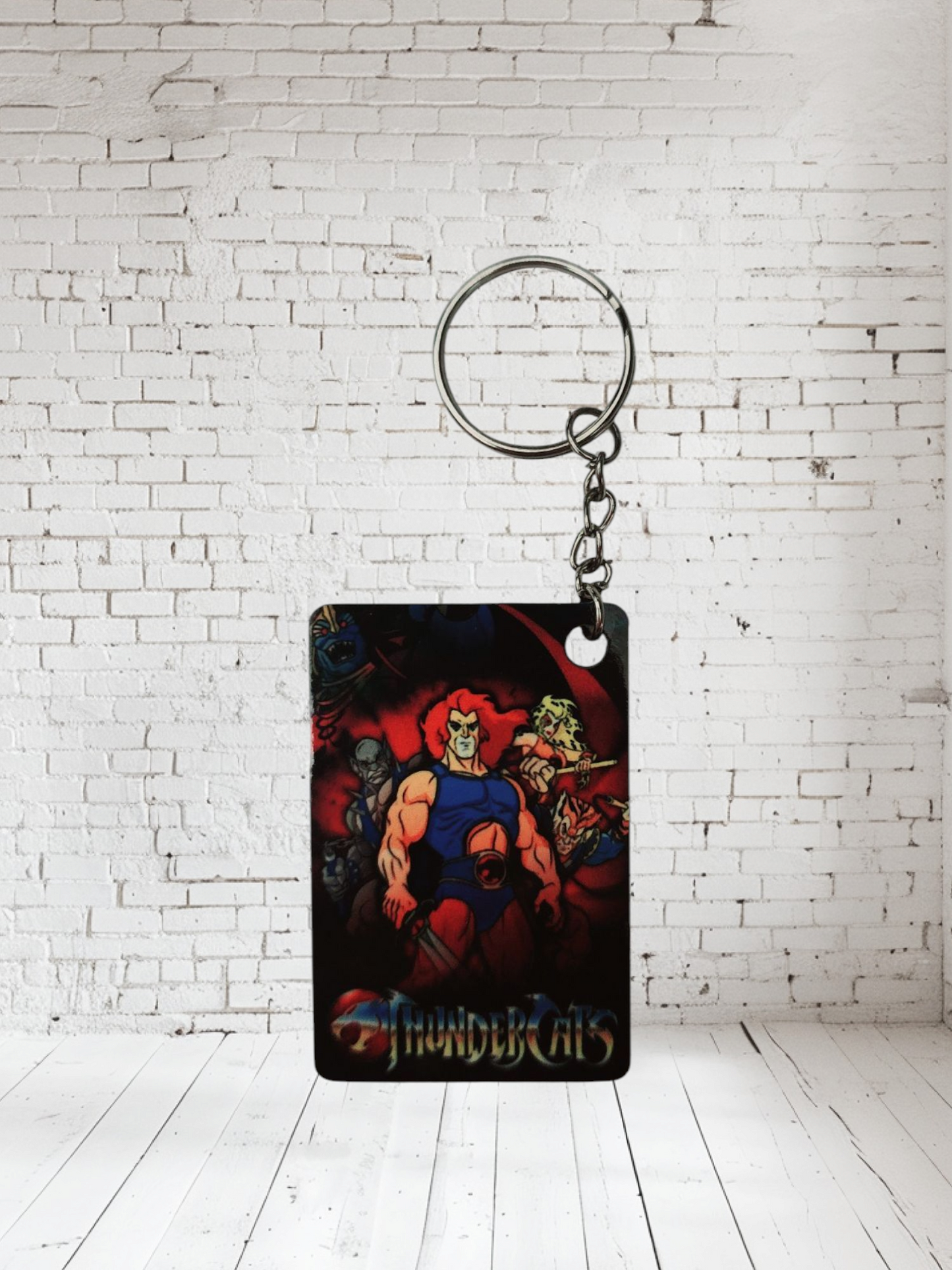 1980's cartoons The Smurfs, Thundercats, Inspecor Gadget and more poster keychains. Multiple designs to choose from