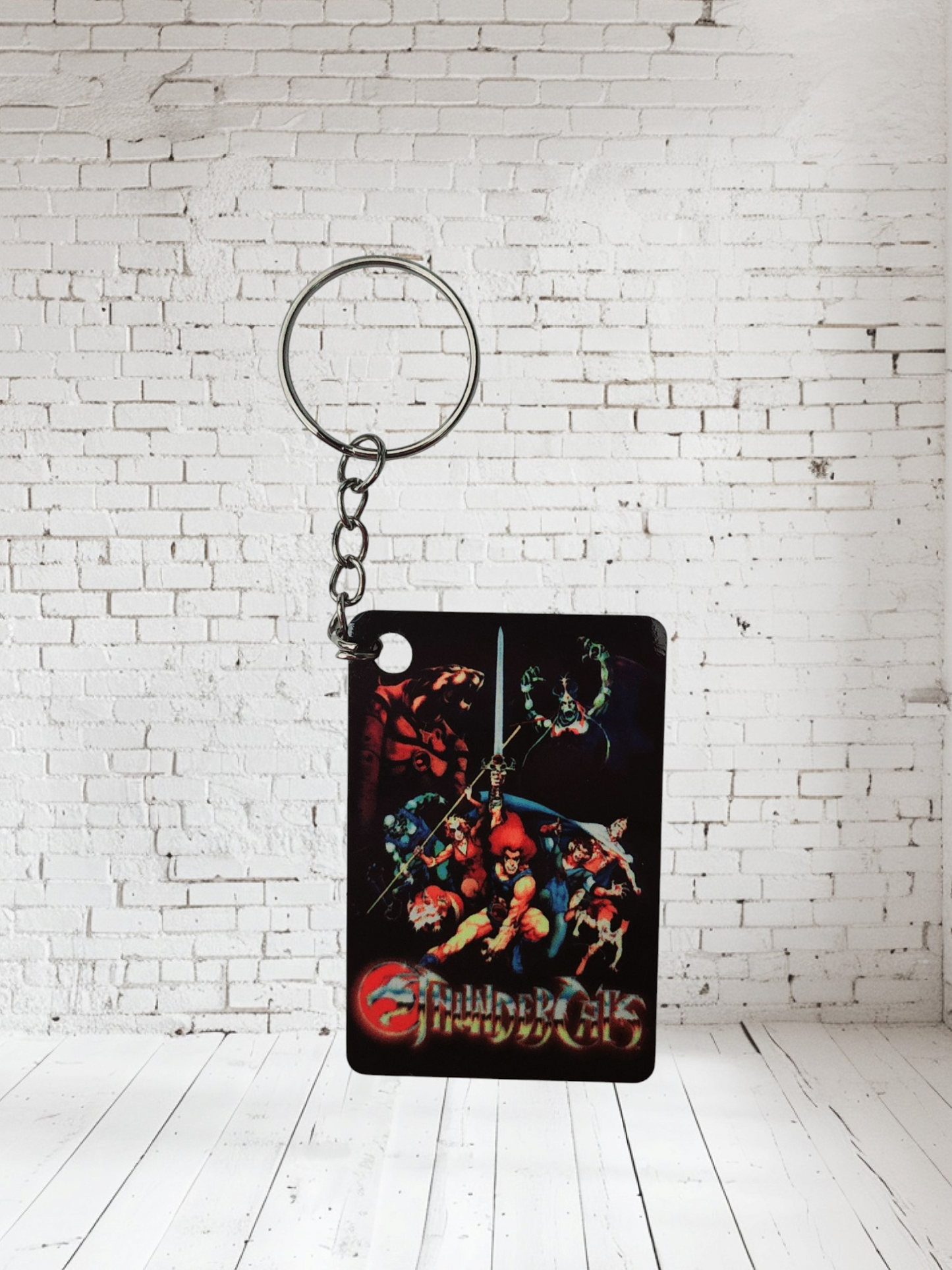 1980's cartoons The Smurfs, Thundercats, Inspecor Gadget and more poster keychains. Multiple designs to choose from