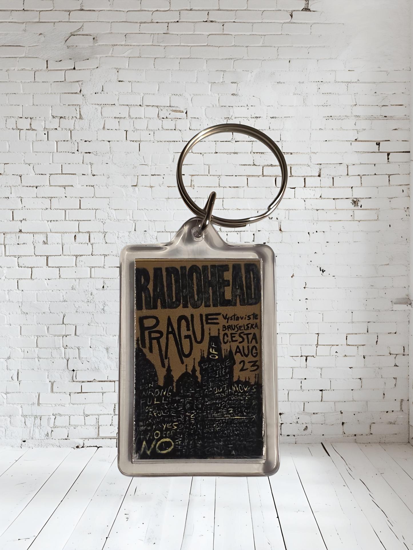 Radiohead concert and album cover keychains with metal prints encased. Plenty to choose from