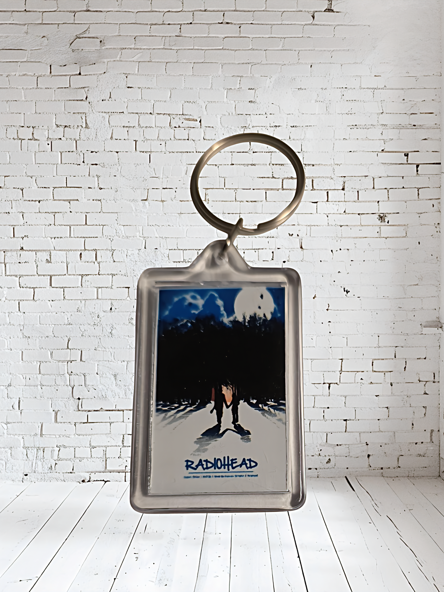 Radiohead concert and album cover keychains with metal prints encased. Plenty to choose from