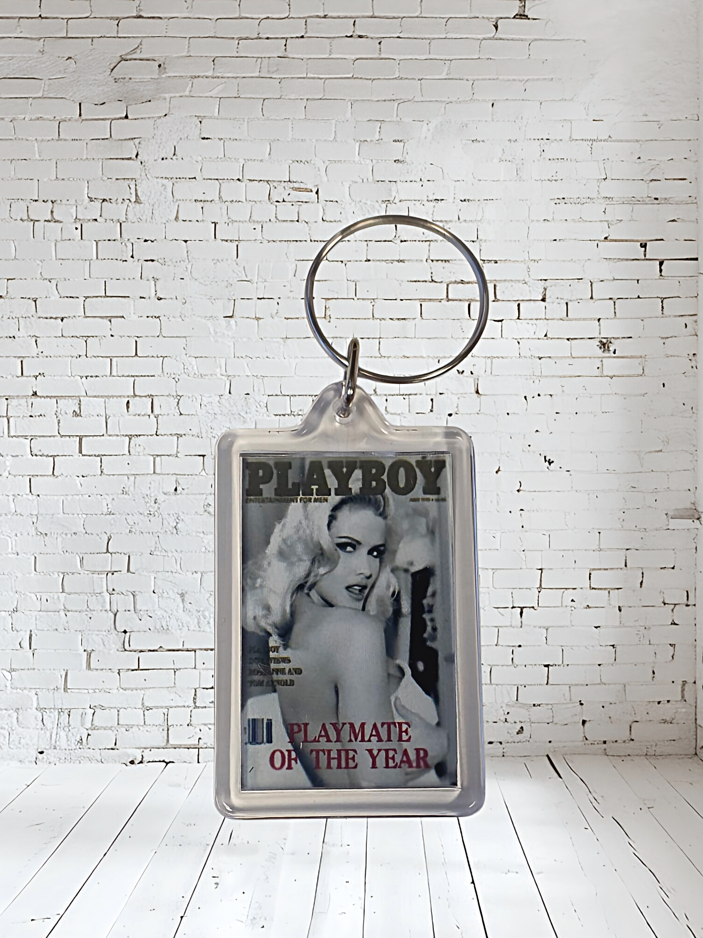 Playboy magazine cover keychains with metal prints encased. Plenty to choose from