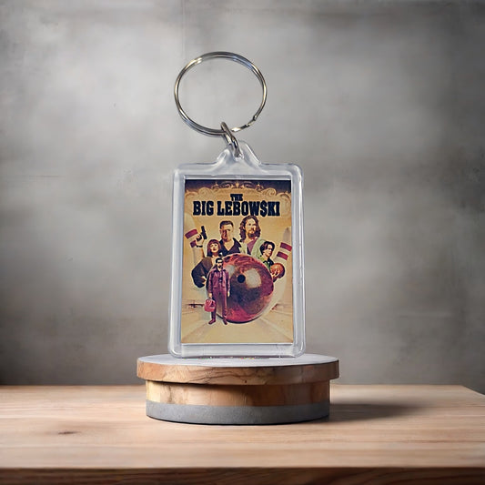 The Big Lebowski movie poster keychain with metal prints encased. Plenty to choose from