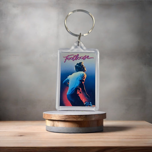 Footloose movie poster keychain with metal prints encased. Plenty to choose from