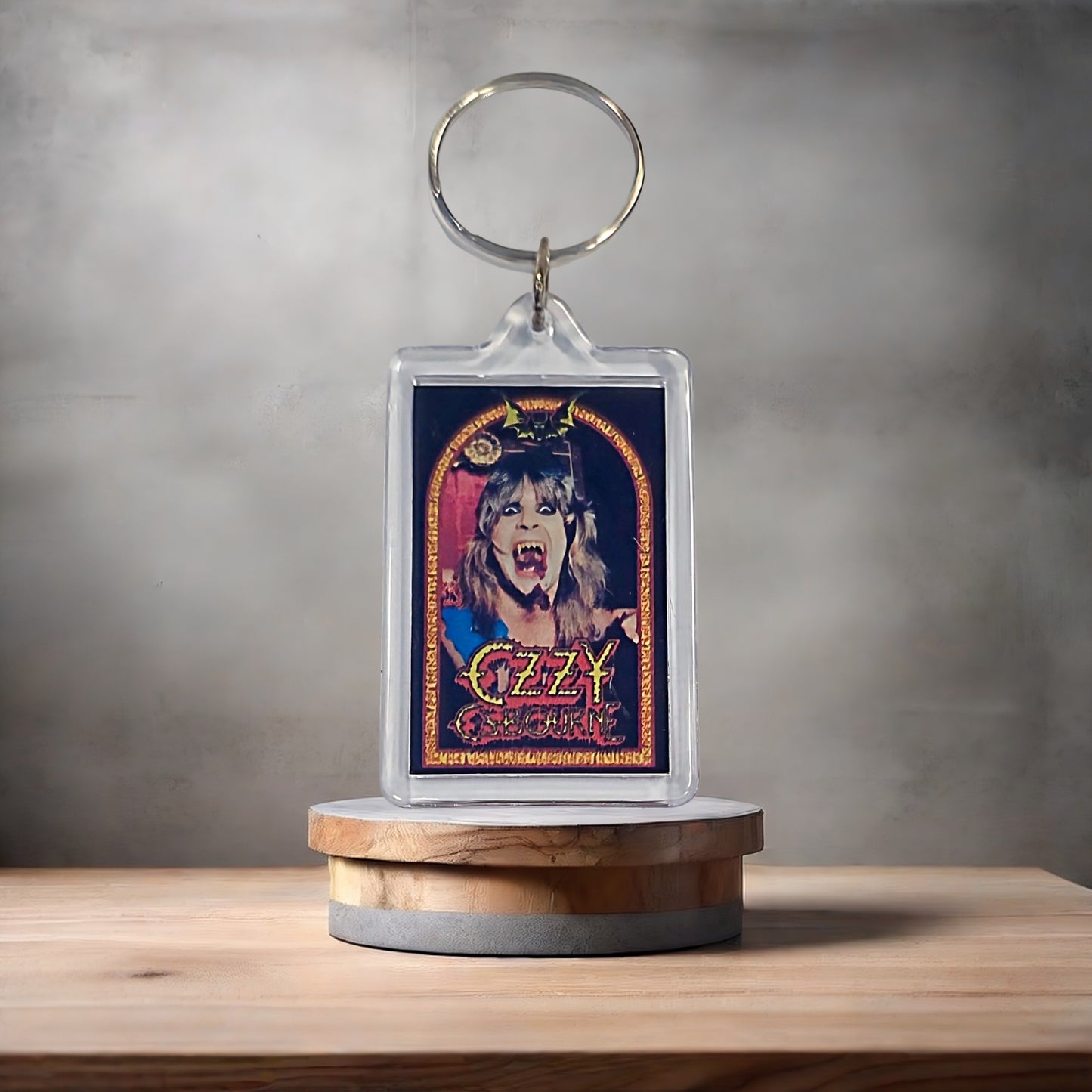 Ozzy Osbourne poster keychain with metal prints encased. Plenty to choose from