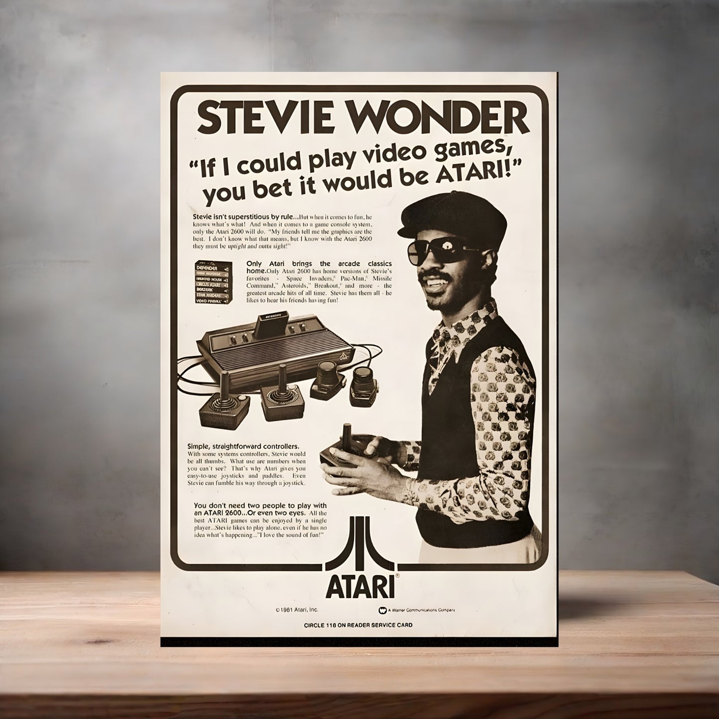 Vintage Atari ad with Stevie Wonder poster on aluminum print. Multiple sizes available