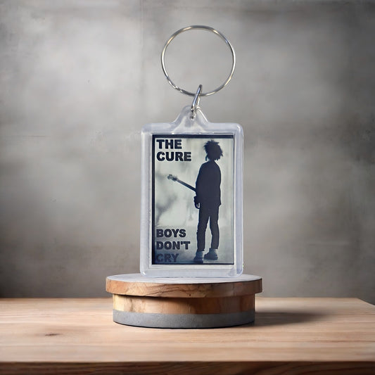 The Cure Boys don't Cry poster keychain with metal prints encased. Plenty to choose from