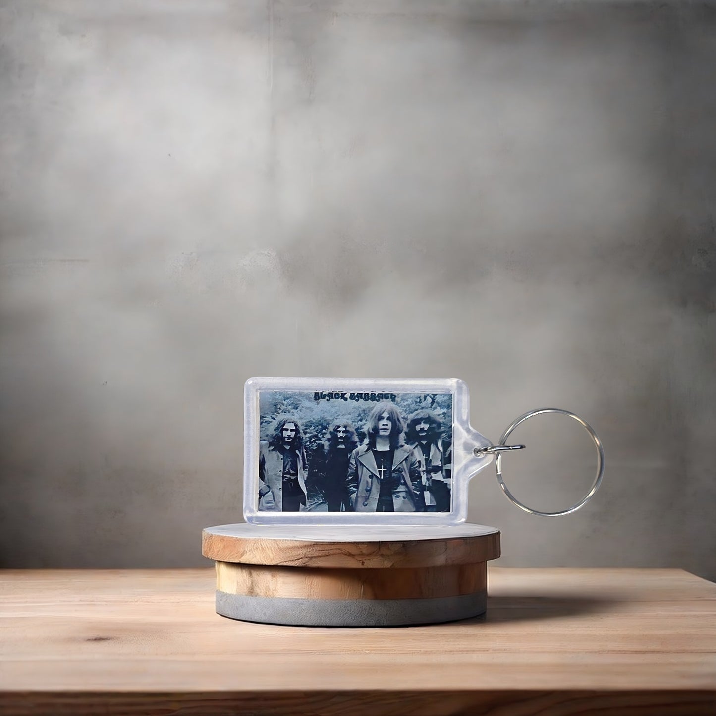 Black Sabbath poster keychain with metal prints encased. Plenty to choose from