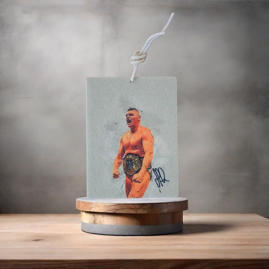 Gunther wrestling photo on car air freshener. Many scents to choose from
