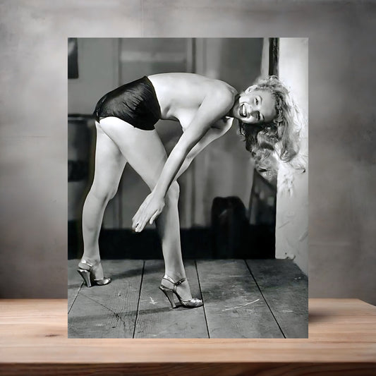 Marilyn Monroe bending over poster on aluminum print. Multiple sizes available