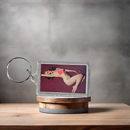 Marilyn Monroe naked poster keychain with metal prints. Adult