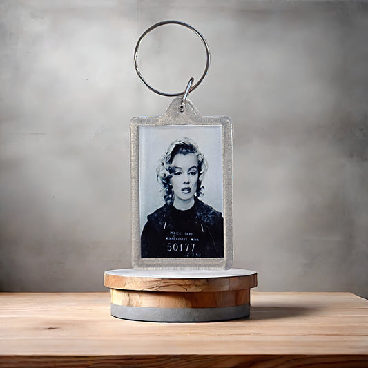 Marilyn Monroe mugshot poster keychain with metal prints. Adult