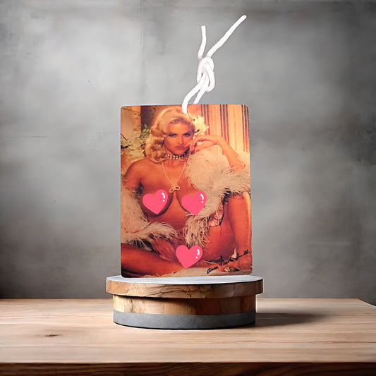 Anna Nicole Smith naked photo on car air freshener. Many scents to choose from