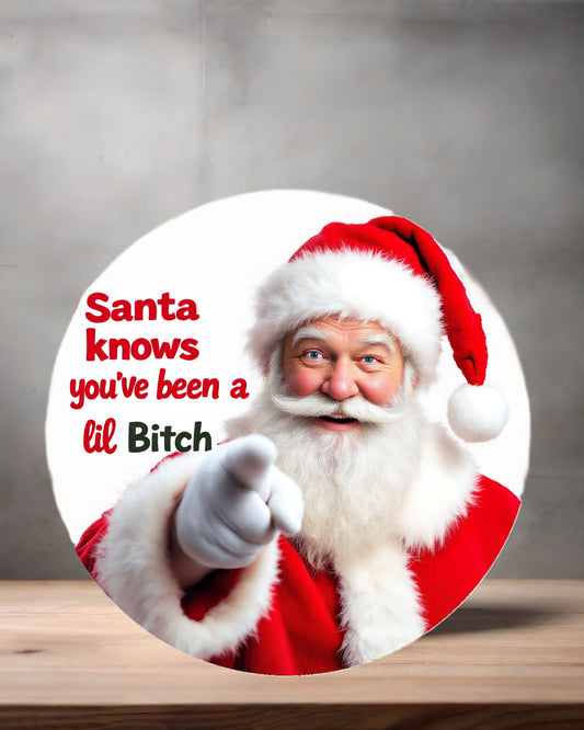 Christmas ornament , 3" round ceramic. Adult themed Santa knows you've been a lil bitch
