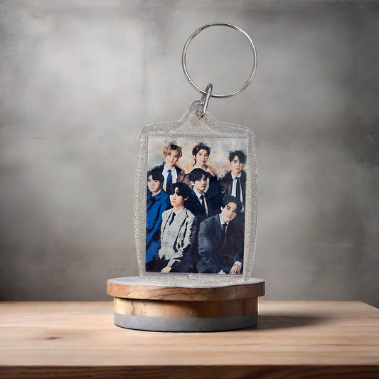 Kpop group BTS poster keychain on aluminum prints.