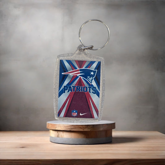 New England Patriots Nike poster keychain on aluminum prints.