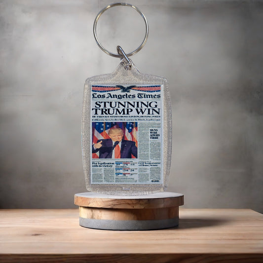 Donald Trump wins election newspaper keychain on aluminum prints.