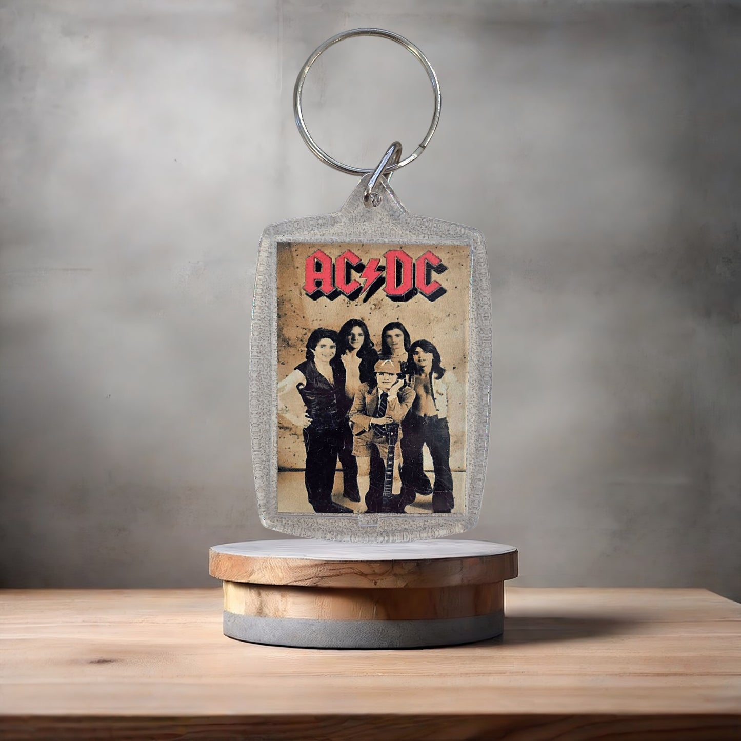 AC/DC poster keychain on aluminum prints.