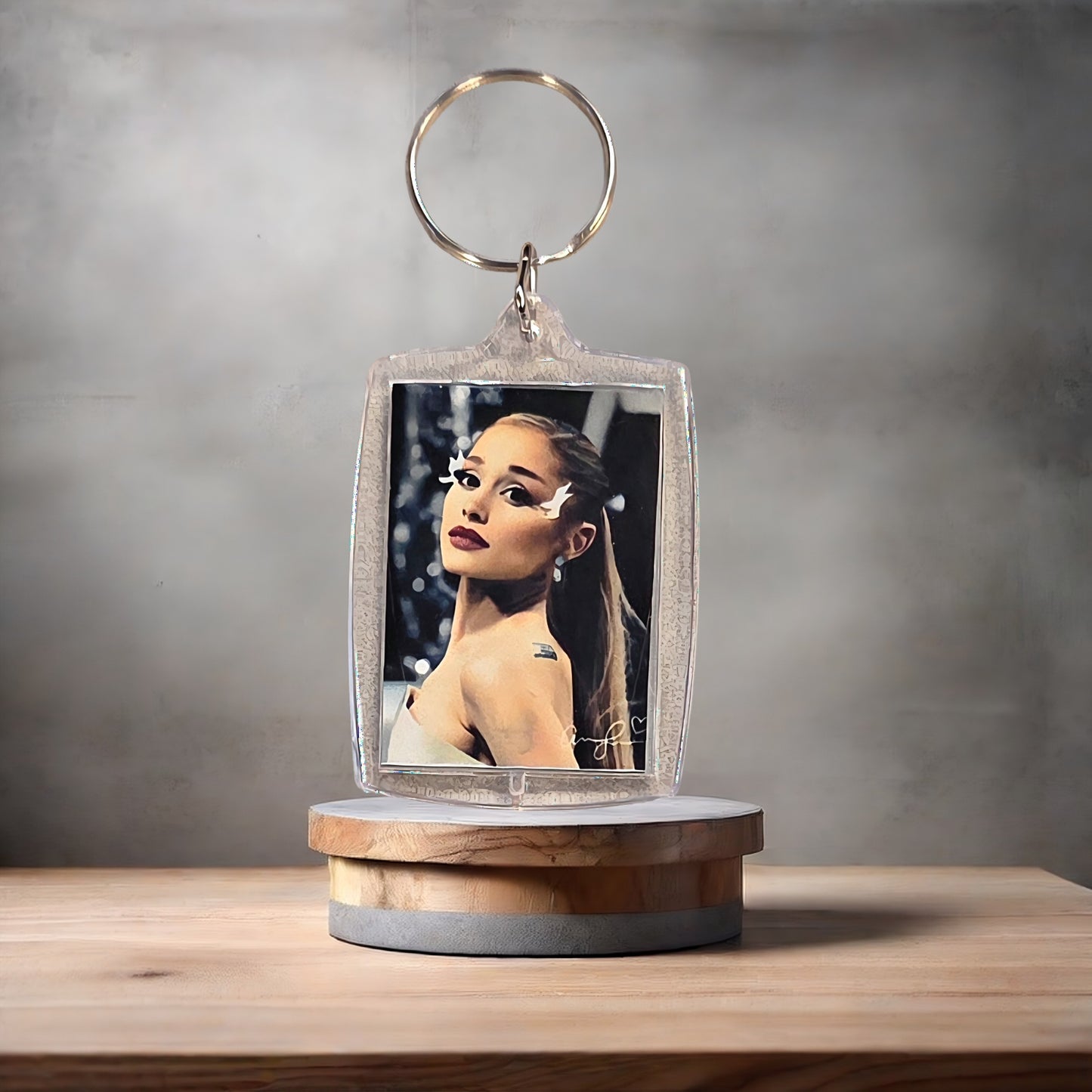 Ariana Grande poster keychain on 2 aluminum prints.