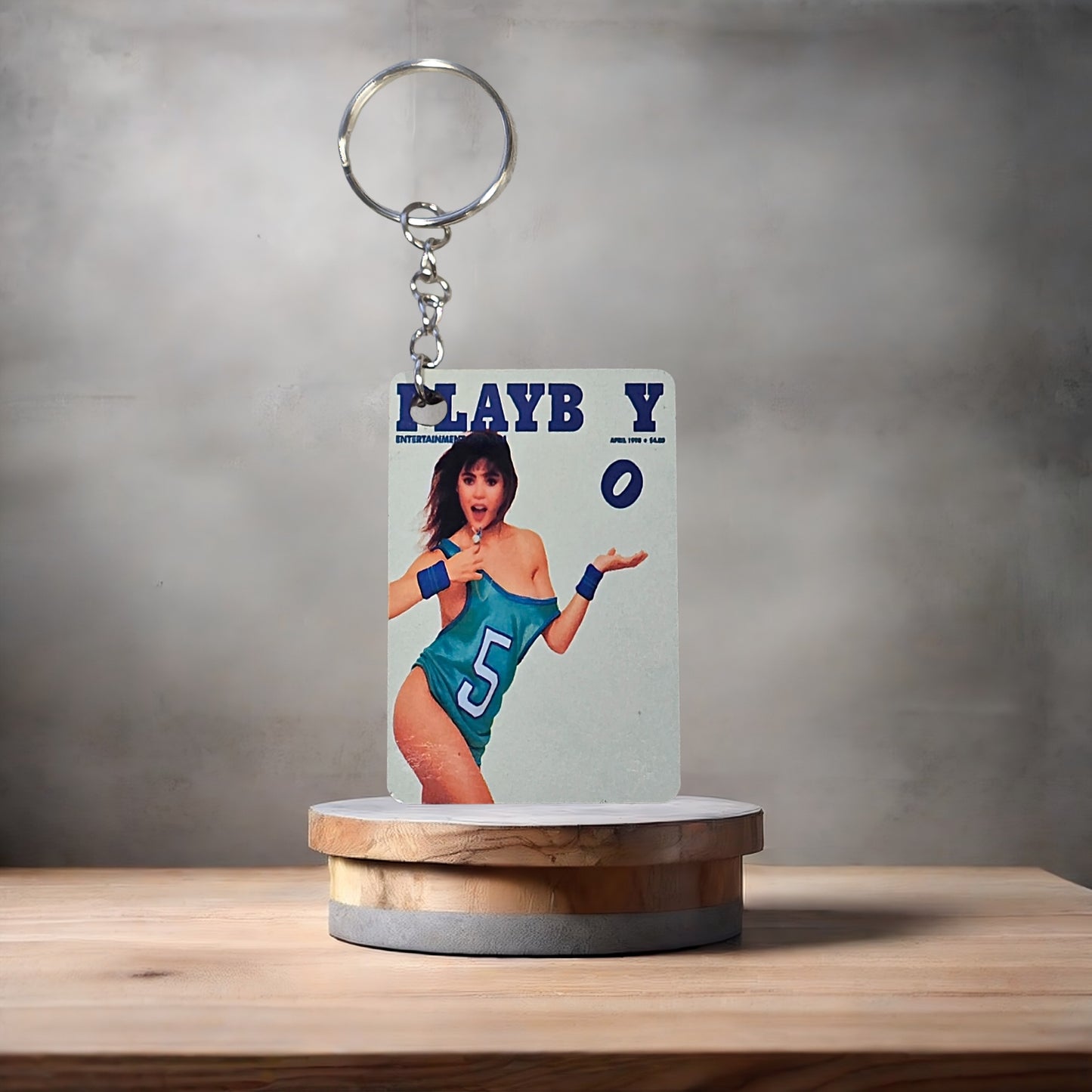 Playboy magazine cover keychain. April 1990