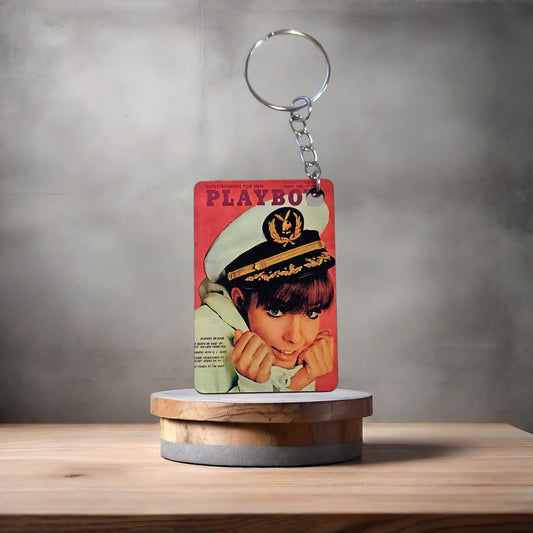 Playboy magazine cover keychain. August 1966