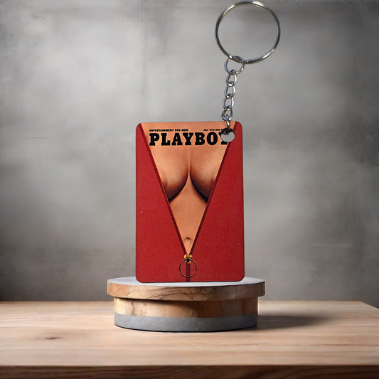 Playboy magazine cover keychain. July 1973