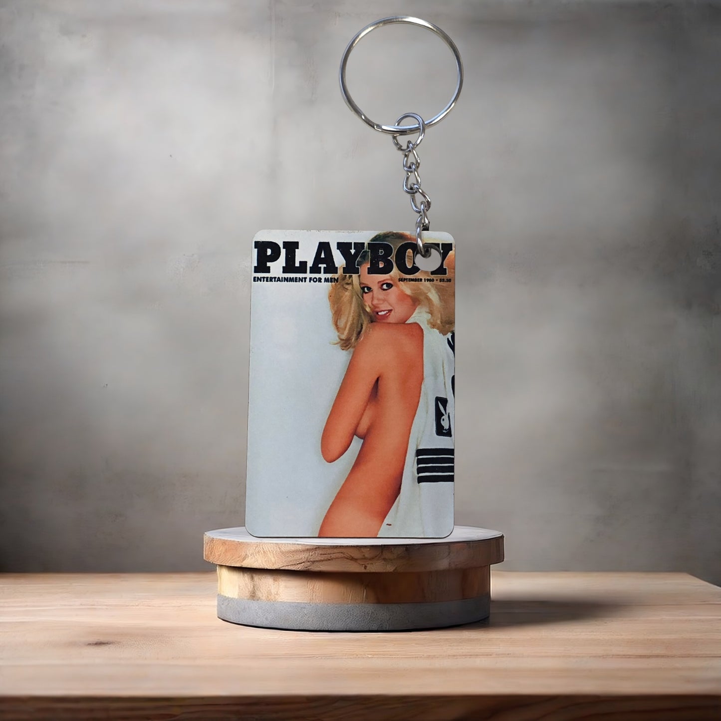 Playboy magazine cover keychain. September 1980