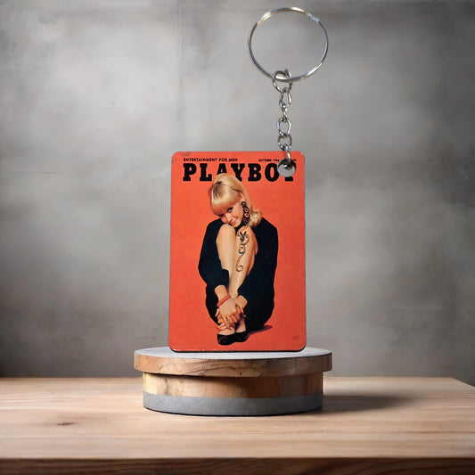 Playboy magazine cover keychain. October 1966