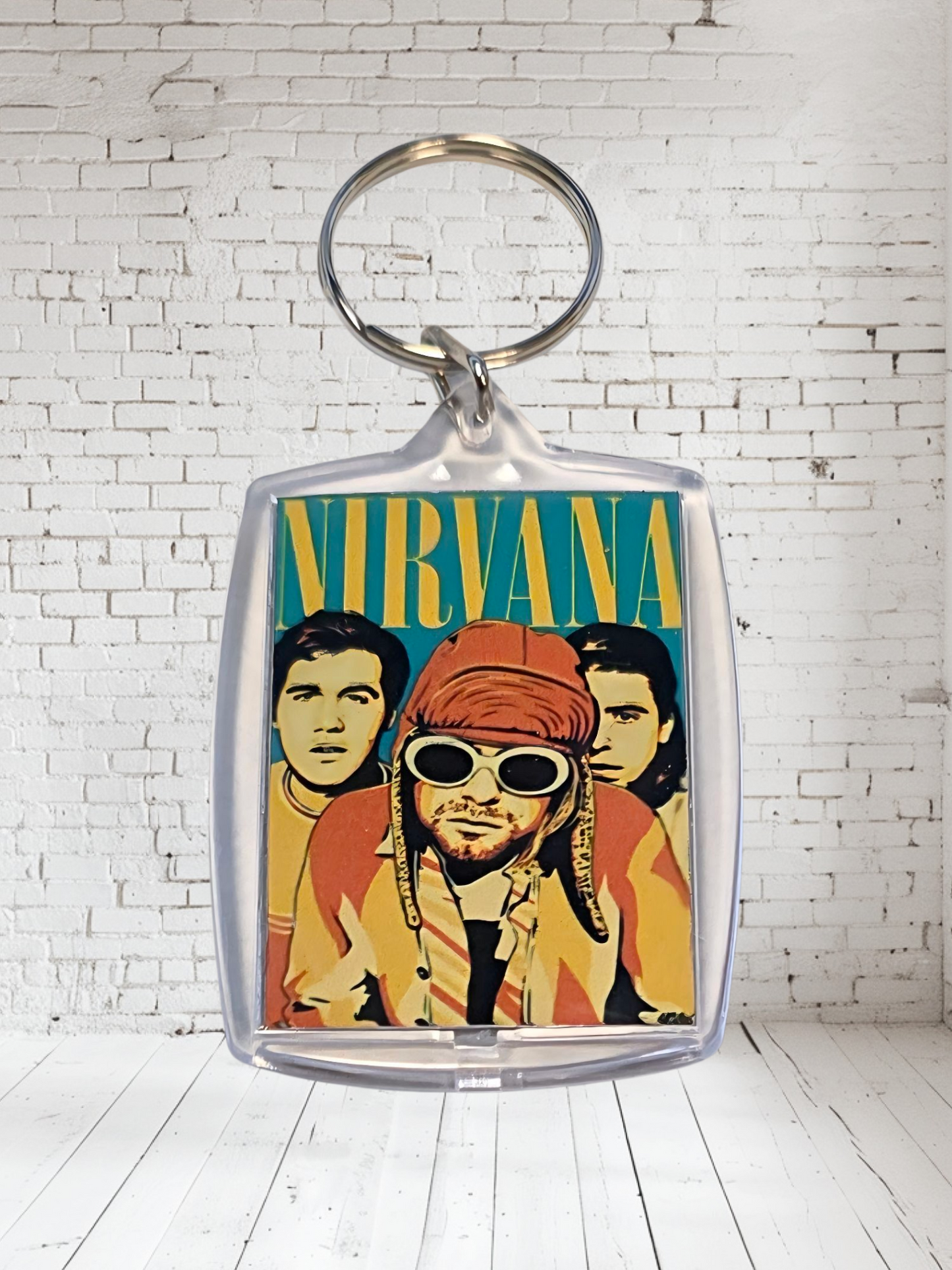 Nirvana concert poster and album cover keychains. Multiple designs to choose from