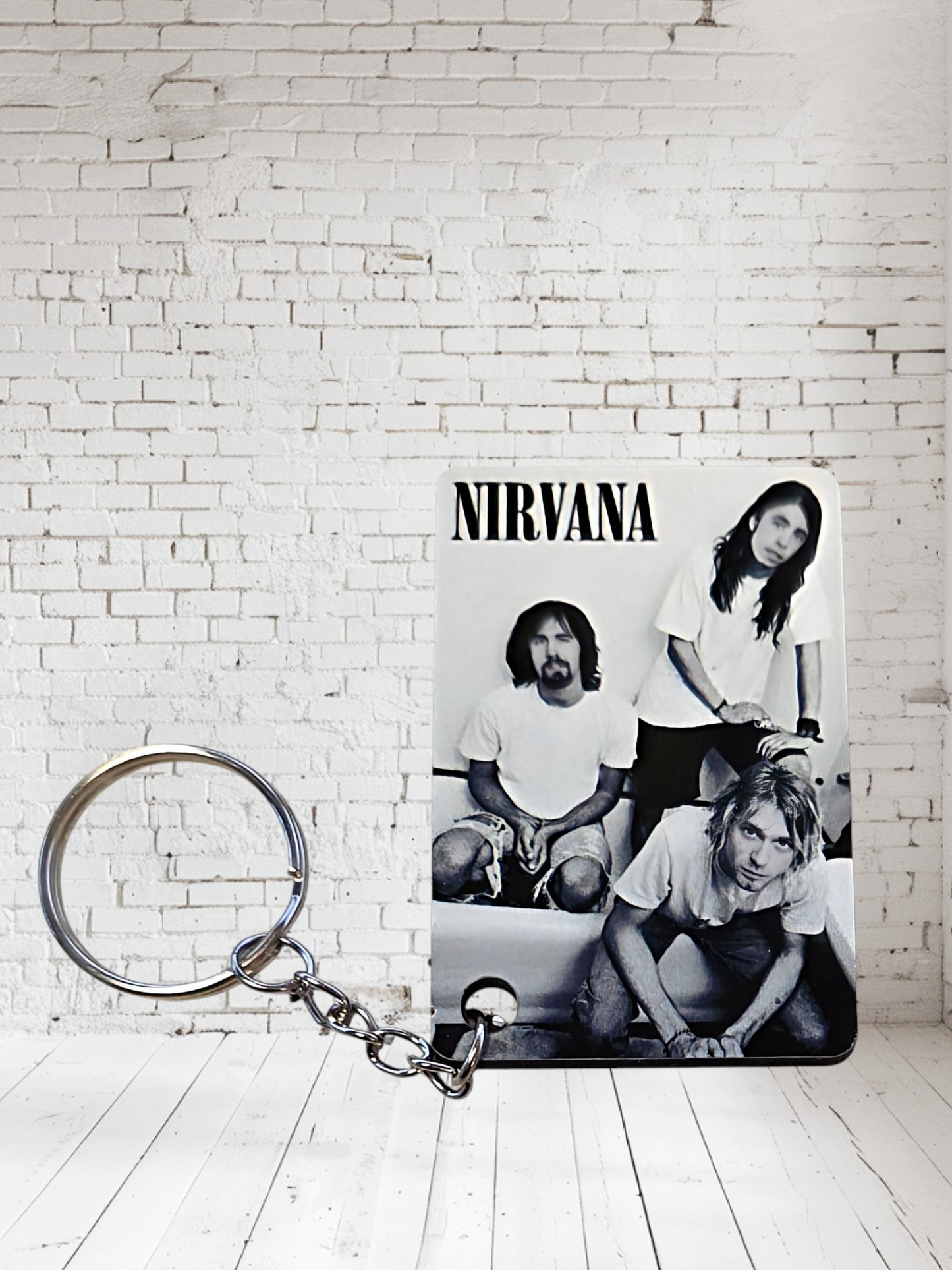 Nirvana concert poster and album cover keychains. Multiple designs to choose from