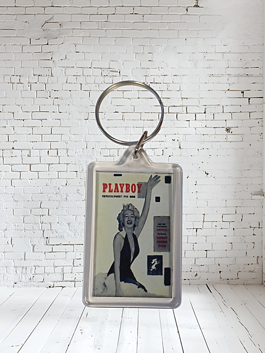 Playboy magazine cover keychains with metal prints encased. Plenty to choose from